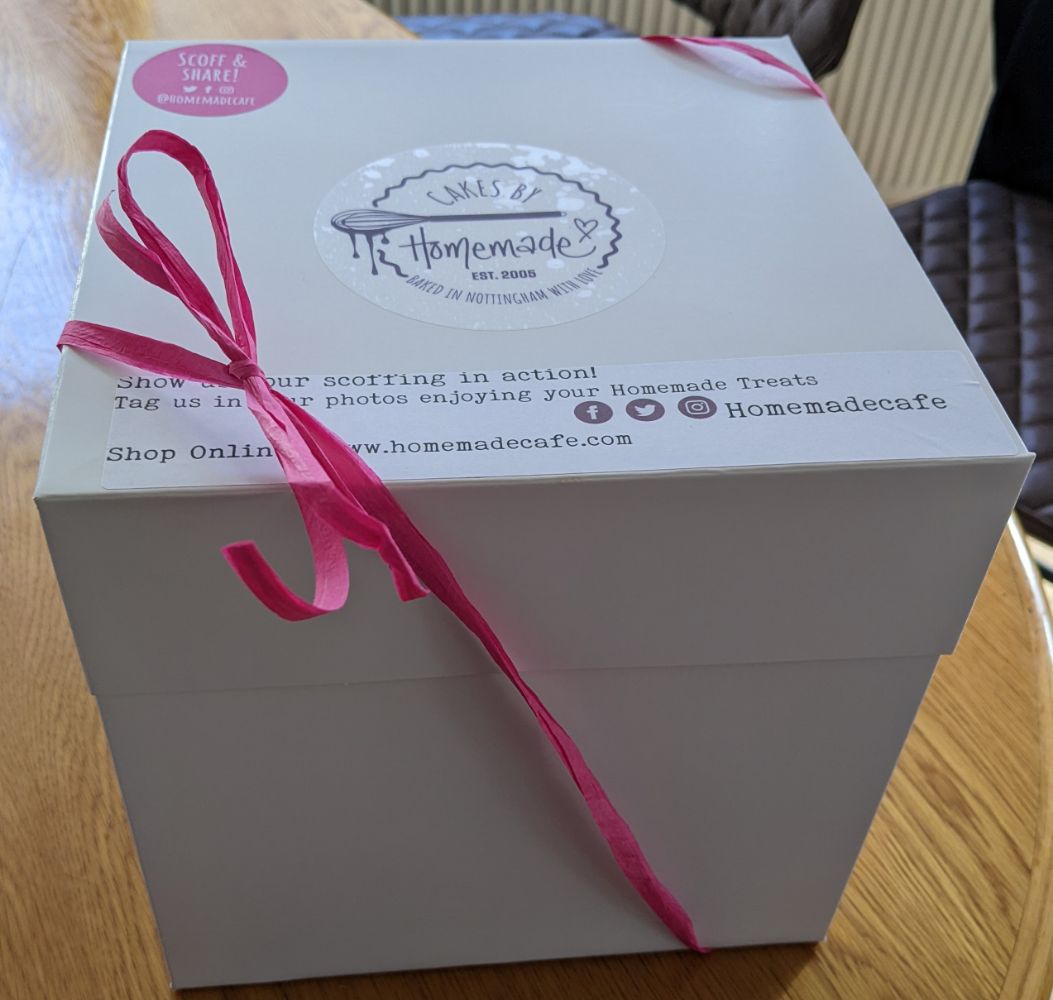 The outside of the box from Homemade, wrapped with a ribbon