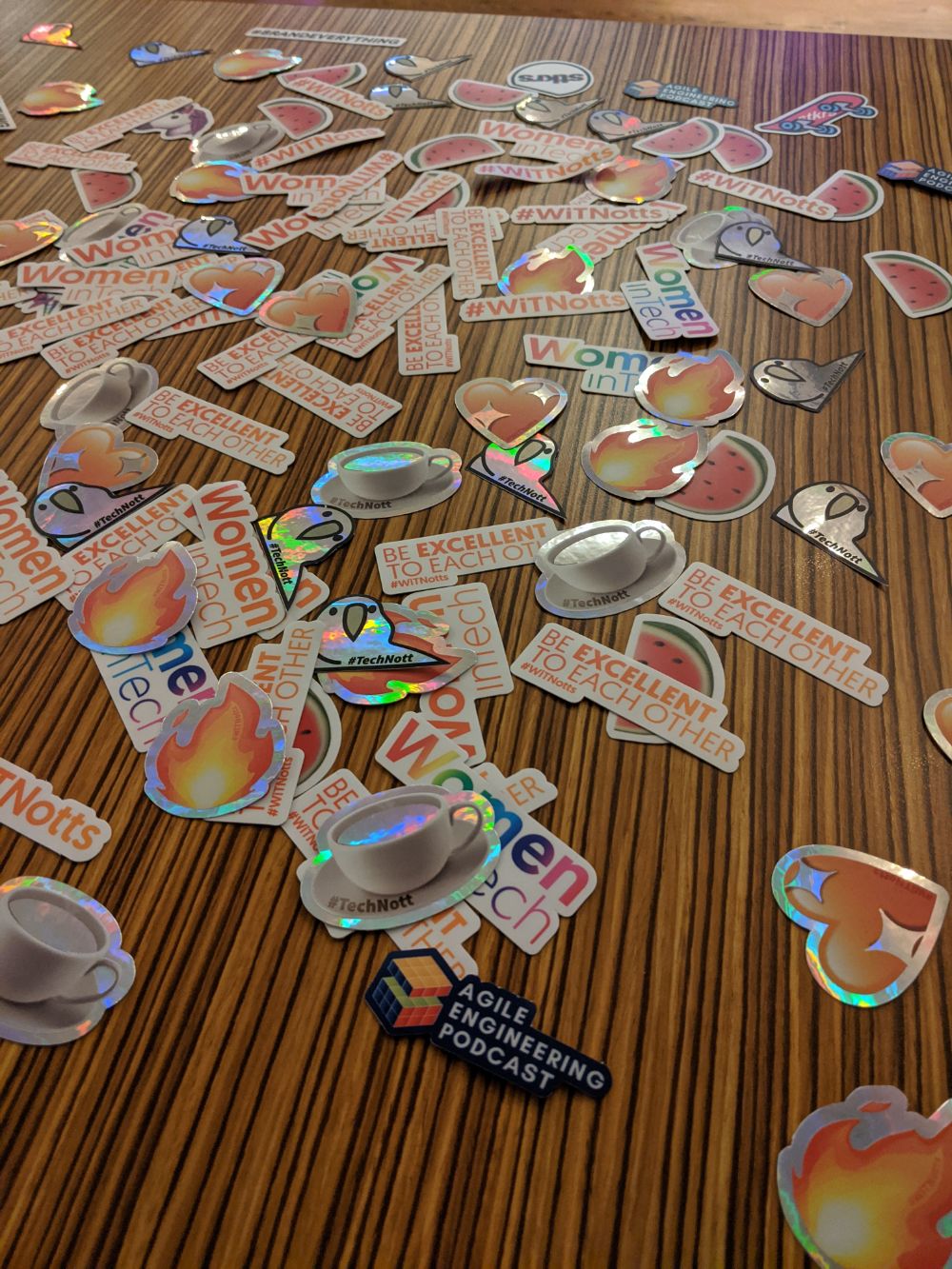 Holographic stickers with the most used Tech Nottingham Slack emoji, custom branded with Tech Nottingham and Women In Tech Nottingham hashtags