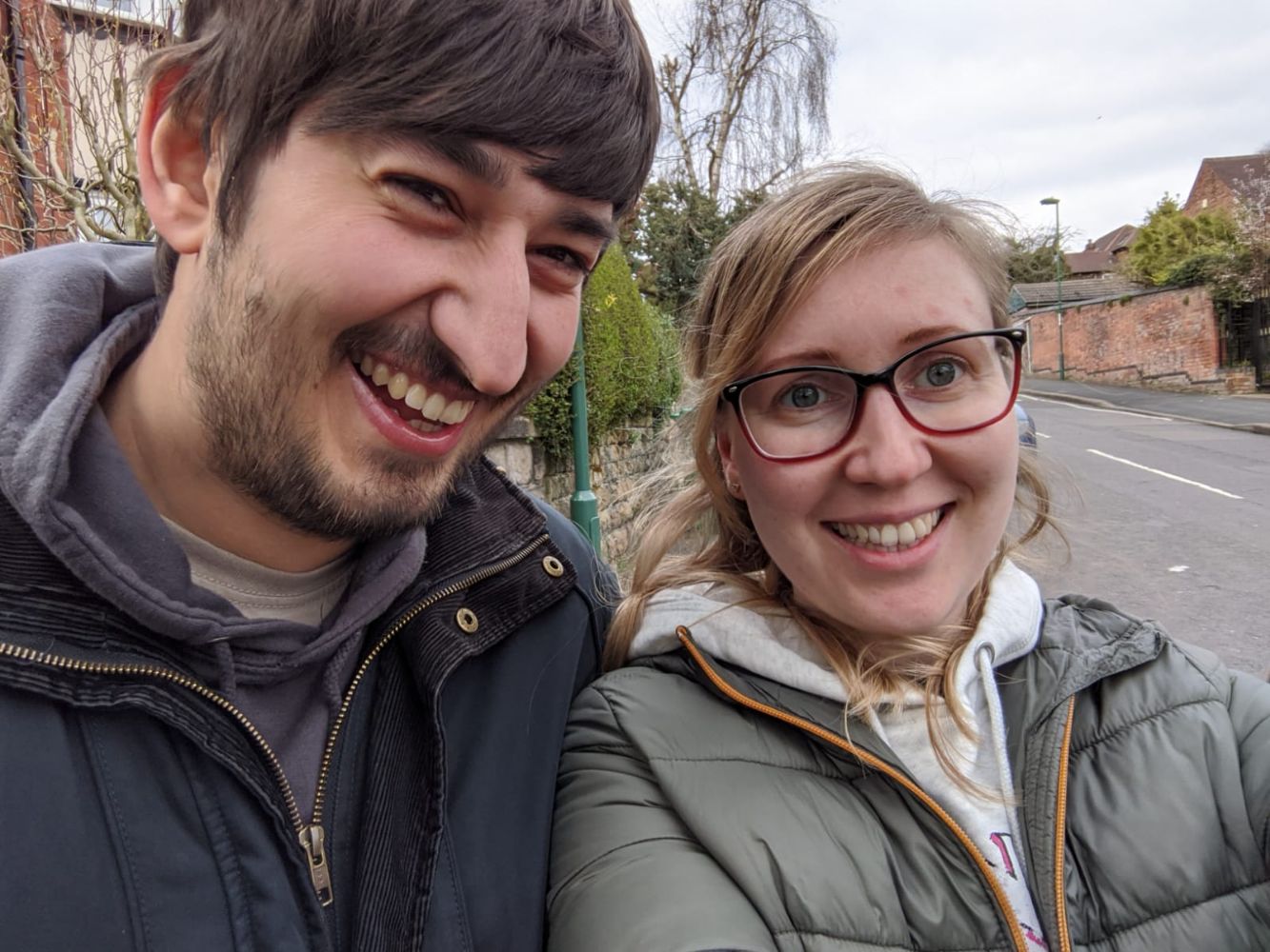 Jamie and Anna smiling, visibly outside